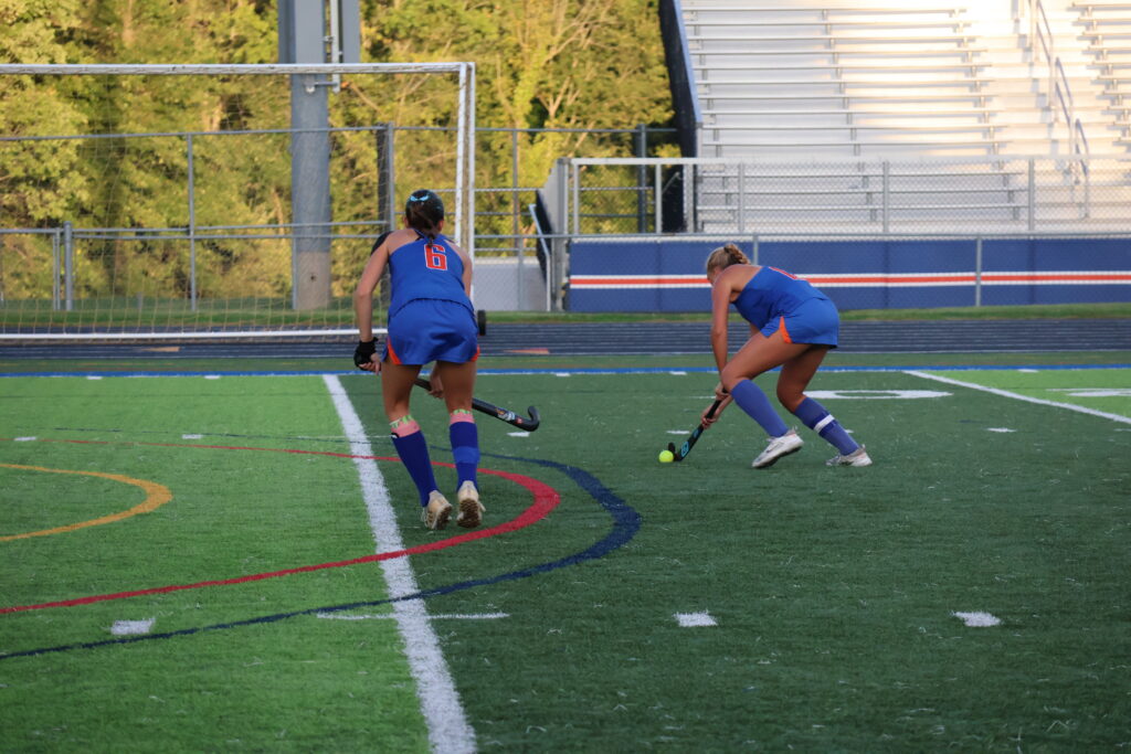 Senior captain Emma Bochenek prepares to shoot the goal that puts Orange up 1-0 in the fourth quarter.