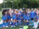 The team circles up during the final minutes of the fourth quarter.