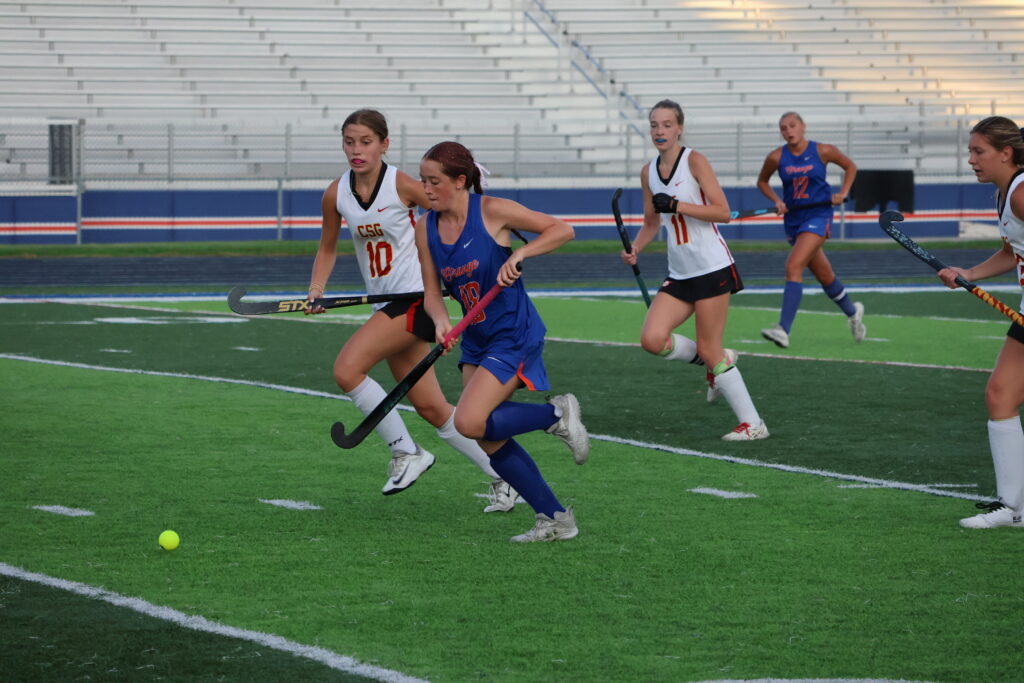 Sophomore Maggie Gardner pushes the ball toward the goal late in the fourth quarter.